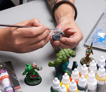 Using acrylic paint on minis.
