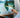 A man painted a picture with brushes.