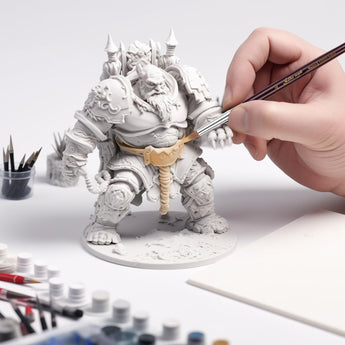 Using a Kolinsky Sable Detail Brush to paint intricate armor details on a large resin giant miniature model.