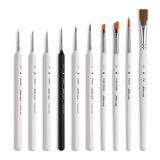 Paint brush set including Kolinsky Sable detail brushes, angle shaders, and flat brushes for fine detailing.