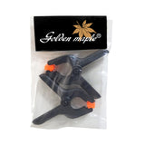 Pack of 2 Golden Maple spring clamps in retail packaging, essential tools for model making and hobby projects.