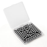 A box of stainless steel paint mixing balls.