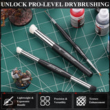 Ergonomic drybrushing and detailing tools on a cutting mat, perfect for texture enhancement and versatility.