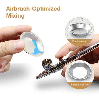Pour the thinned paint from the palette into the airbrush.