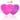 Silicone brush cleaners in pink and purple, heart-shaped.