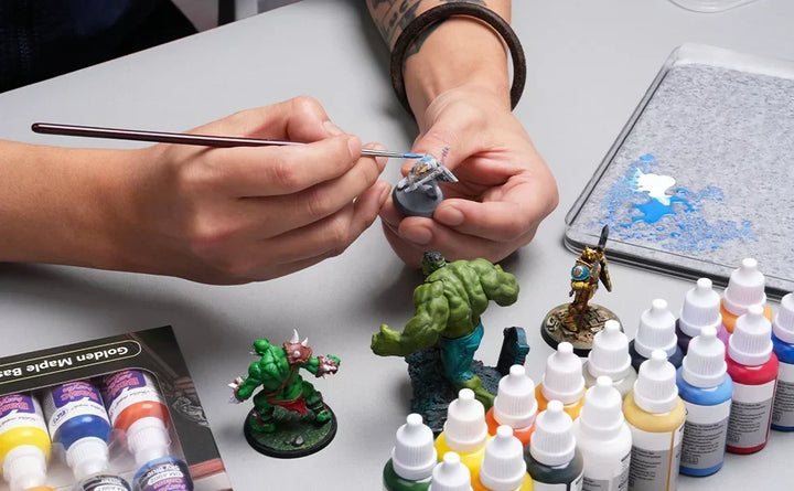 Using acrylic paint on minis.