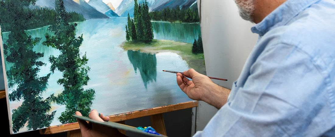 A man painted a picture with brushes.