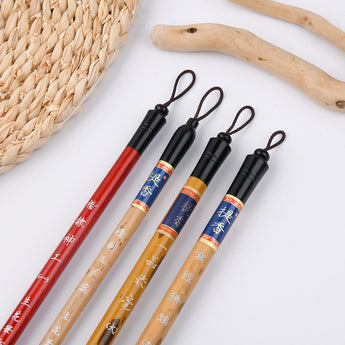 4 traditional Chinese calligraphy brushes featuring various natural wood handles and hanging loops.
