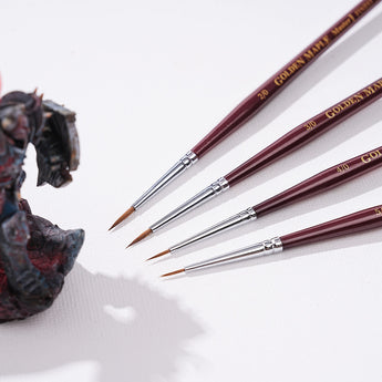 Set of professional detail brushes in sizes 2/0 to 5/0 for precision miniature painting.
