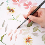 Professional finest sable round brush painting soft watercolor floral petals on paper.