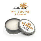 White sponge soft texture art tool in a metal tin for adjusting paint thickness and brush cleaning.