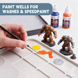 Dip the brush into acrylic paint to apply it to the miniature.