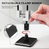 The miniature vise features a detachable clamp design for easy repositioning and includes a non-slip adhesive pad.