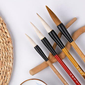 Set of 4 traditional Calligraphy Brushes with natural hair bristles. Perfect for sumi-e, watercolor, and detail work.