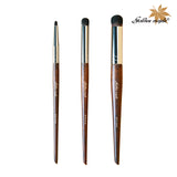 Three different sizes of dry brushes.