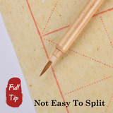Precision Chinese Calligraphy Brush with full, non-splitting tip, fine natural bristles for detailed work on textured paper.